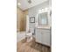 Cozy bathroom with tile floors, neutral colors, and shower at 320 Harvest View Ter, Woodstock, GA 30188