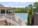 View of community pool, patio area and clubhouse at 320 Harvest View Ter, Woodstock, GA 30188