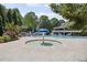 Splash pad and zero entry pool overlook clubhouse and play area at 320 Harvest View Ter, Woodstock, GA 30188