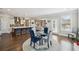 Dining area flows from the kitchen and living area, ideal for gatherings at 320 Harvest View Ter, Woodstock, GA 30188