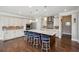 Gourmet kitchen with a large island, stainless steel appliances, and custom cabinetry at 320 Harvest View Ter, Woodstock, GA 30188