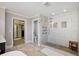 Main bathroom with a large tiled shower and pebble flooring at 320 Harvest View Ter, Woodstock, GA 30188