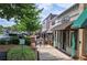 Street view of downtown with shops, sidewalks, and plenty of parking options for visitors at 320 Harvest View Ter, Woodstock, GA 30188