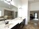 Bathroom featuring double vanity, tub and separate shower with glass door. Opens to the Primary bedroom at 4769 Moon Hollow Ct, Buford, GA 30519