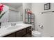 Updated bathroom featuring a vanity with a shower and modern fixtures at 1539 Creek Bend Ln, Lawrenceville, GA 30043