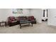 Spacious living room with comfortable seating and easy access to an adjacent bedroom at 1539 Creek Bend Ln, Lawrenceville, GA 30043