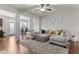 Spacious living room with hardwood floors, decorative columns and natural light at 1539 Creek Bend Ln, Lawrenceville, GA 30043