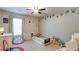 Charming bedroom with neutral colors, playful monkey wall decals, and ample natural light at 156 Woodhouse Cir, Acworth, GA 30102