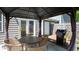 Outdoor gazebo with table, chairs, grill, and charming decor for relaxing, entertaining, and outdoor dining at 156 Woodhouse Cir, Acworth, GA 30102