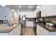 Modern kitchen featuring granite counters, stainless steel appliances, and white cabinetry at 156 Woodhouse Cir, Acworth, GA 30102