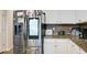 Gourmet kitchen featuring stainless steel refrigerator with built in display and ample storage at 156 Woodhouse Cir, Acworth, GA 30102