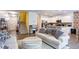 Open-concept living space with a modern kitchen, cozy seating area, and stylish decor at 156 Woodhouse Cir, Acworth, GA 30102