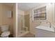 The bathroom features a new vanity, fixtures, and walk-in shower at 2325 Lago Dr, Jonesboro, GA 30236