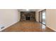 Living room features a stone fireplace, sliding glass doors, and tile floors at 2325 Lago Dr, Jonesboro, GA 30236