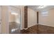 Partially-finished basement living space has a window and access to another room at 2325 Lago Dr, Jonesboro, GA 30236