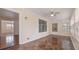 Sunroom features tile flooring, a ceiling fan, neutral walls, and lots of windows at 2325 Lago Dr, Jonesboro, GA 30236