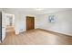 Bright bedroom with closet and updated flooring at 6648 Florence Dr, Lithia Springs, GA 30122