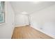 Bright bedroom featuring updated flooring and a side entrance at 6648 Florence Dr, Lithia Springs, GA 30122