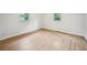 Bright bedroom featuring updated flooring and double windows at 6648 Florence Dr, Lithia Springs, GA 30122