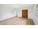 Bright bedroom with closet and updated flooring at 6648 Florence Dr, Lithia Springs, GA 30122