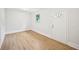 Bright bedroom featuring updated flooring and a side entrance at 6648 Florence Dr, Lithia Springs, GA 30122