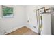 Utility room with updated flooring and newer water heater at 6648 Florence Dr, Lithia Springs, GA 30122