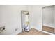 Utility room with updated flooring and newer water heater at 6648 Florence Dr, Lithia Springs, GA 30122