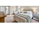 Inviting bedroom with a plush bed, carpet, and neutral colors with a view to the ensuite bath at 1750 Clairmont Rd # 32, Decatur, GA 30033