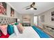 Nicely decorated bedroom with plush pillows, lots of artwork, and access to an ensuite bath at 1750 Clairmont Rd # 32, Decatur, GA 30033