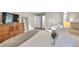 Spacious bedroom with a view to an ensuite bathroom, soft carpet, and neutral walls at 1750 Clairmont Rd # 32, Decatur, GA 30033