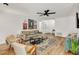 Open living room with hardwood floors, modern furniture, and bright, inviting atmosphere at 1750 Clairmont Rd # 32, Decatur, GA 30033