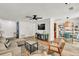Open living space with hardwood floors, stylish furniture, and a view into the dining area at 1750 Clairmont Rd # 32, Decatur, GA 30033