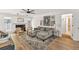 Bright living room with fireplace, hardwood floors, modern furniture, and an open layout at 1750 Clairmont Rd # 32, Decatur, GA 30033