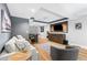 Basement living area featuring a ping pong table and entertainment center at 305 Jasmine Ct, Woodstock, GA 30189