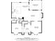 Detailed first-floor plan showing layout of kitchen, living room, dining room, and office at 305 Jasmine Ct, Woodstock, GA 30189