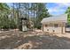 Community playground with swings, slides, and play structure for Gathering enjoyment at 305 Jasmine Ct, Woodstock, GA 30189