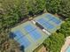 Aerial view of community tennis courts, providing residents with recreational opportunities at 305 Jasmine Ct, Woodstock, GA 30189