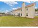 Backyard featuring a well-manicured lawn, ideal for outdoor recreation and relaxation at 6637 Chason Woods Ct, Jonesboro, GA 30238