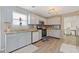 Bright kitchen featuring updated cabinets, modern appliances, and stylish countertops at 6637 Chason Woods Ct, Jonesboro, GA 30238