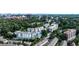 Overhead view showcasing condos buildings with a refreshing pool area, surrounded by a mix of trees and residences at 130 26Th St # 402, Atlanta, GA 30309