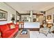 Open kitchen with stainless steel appliances, brick accent wall, and breakfast bar at 130 26Th St # 402, Atlanta, GA 30309