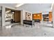 Elegant lobby featuring modern furniture, artwork, and a sleek, polished terrazzo floor at 130 26Th St # 402, Atlanta, GA 30309