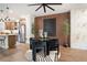 Chic dining space with a modern glass table, black chairs, and elegant accents at 2505 Astaire Nw Ct, Atlanta, GA 30318