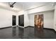 Spacious garage features epoxy flooring and plenty of room for parking and storage at 2505 Astaire Nw Ct, Atlanta, GA 30318