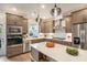 Modern kitchen with stainless steel appliances, light countertops, and wooden cabinets at 2505 Astaire Nw Ct, Atlanta, GA 30318