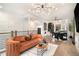 Open living space with hardwood floors, modern decor, and an inviting seating area at 2505 Astaire Nw Ct, Atlanta, GA 30318