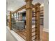 Living room with modern railings, sofa, and wet bar at 2505 Astaire Nw Ct, Atlanta, GA 30318