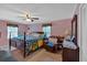 Bedroom featuring carpeted floor, pink walls, and a classic wooden dresser at 316 Shiloh Hills Nw Dr, Kennesaw, GA 30144