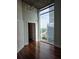 Bedroom featuring a large window with a view, and a walk-in closet at 3324 Peachtree Ne Rd # 3001, Atlanta, GA 30326
