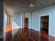 Comfortable bedroom featuring hardwood floors, neutral walls, and ample closet space at 3324 Peachtree Ne Rd # 3001, Atlanta, GA 30326